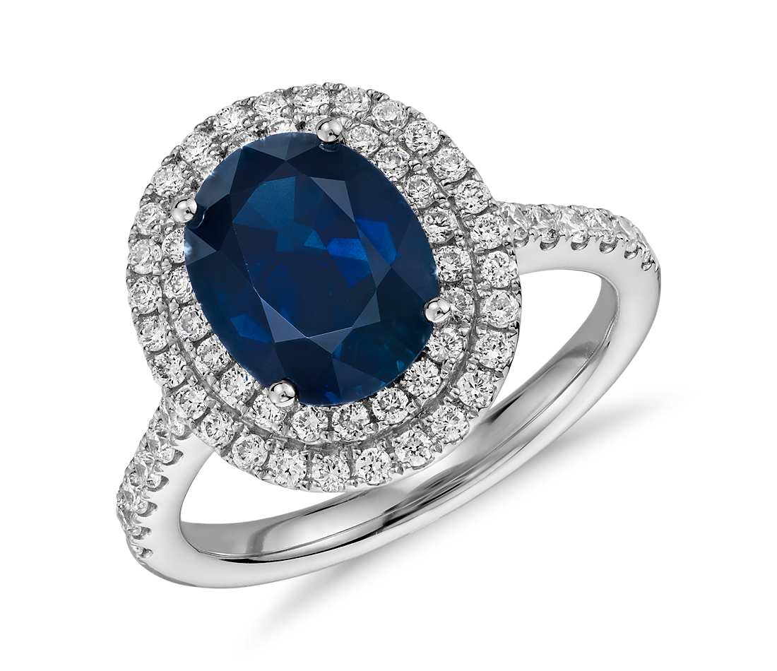 micro-pave setting engagement ring with blue sapphire