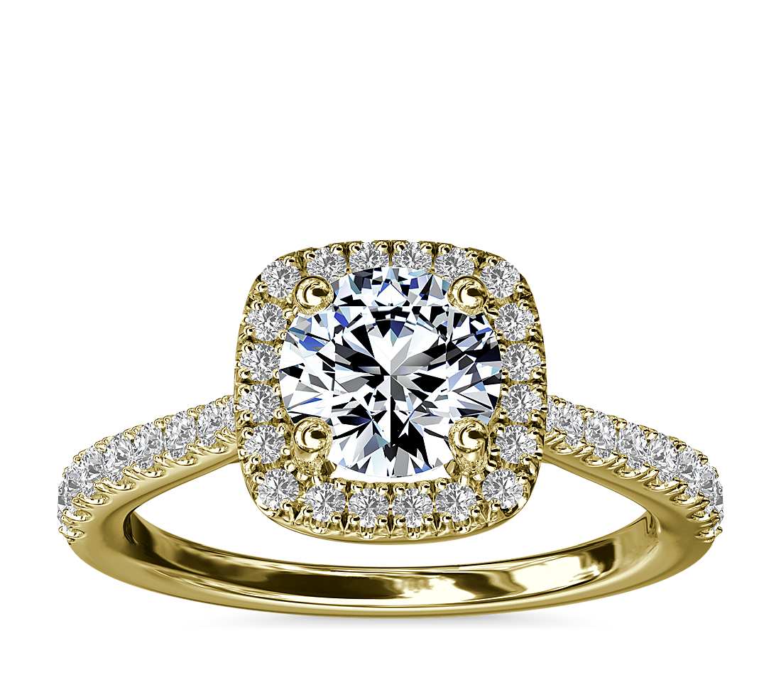Tapered halo band engagement ring