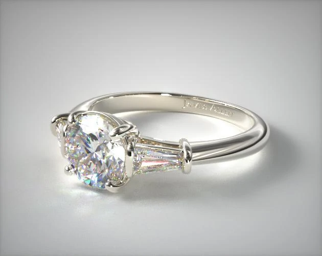 Three stone engagement ring