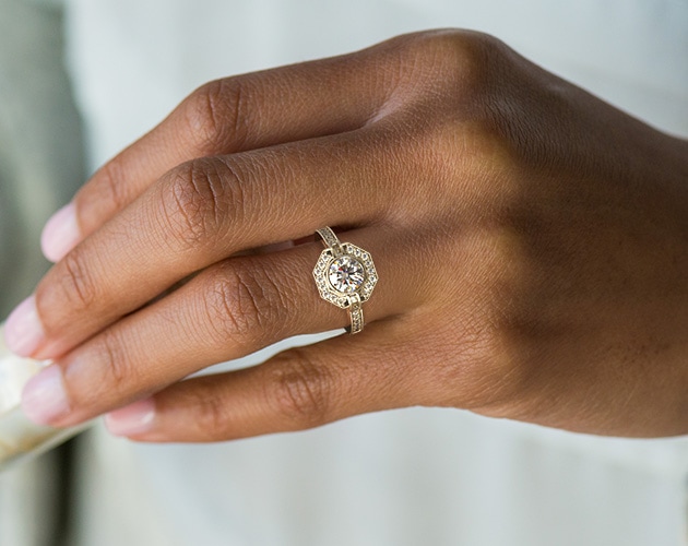 Girl wearing Art Deco engagement ring