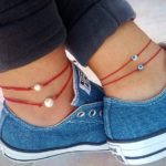 Girl wearing casual foot jewelry