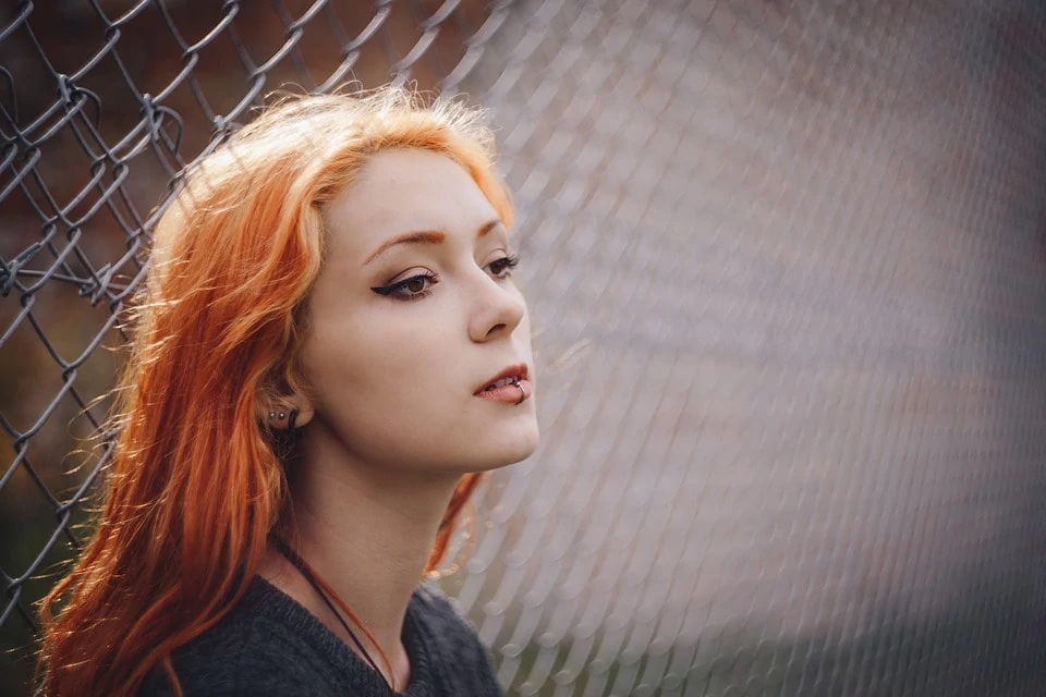 Girl with lip piercing redhead