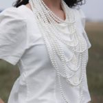 Girl wearing pearl necklace