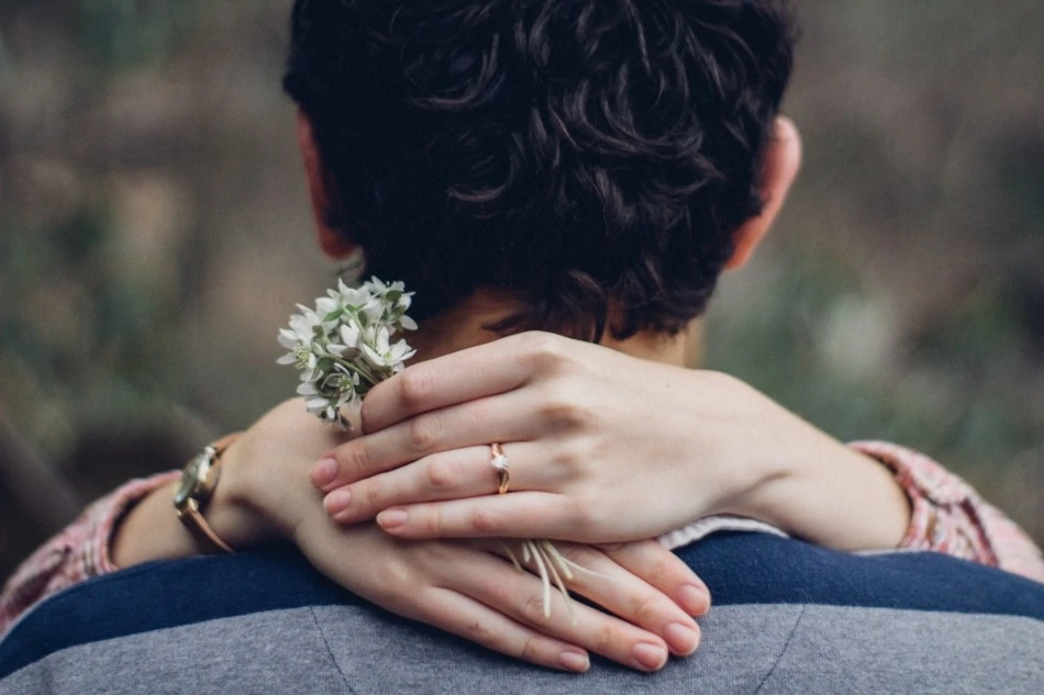 Girl wearing pear cut engagement ring