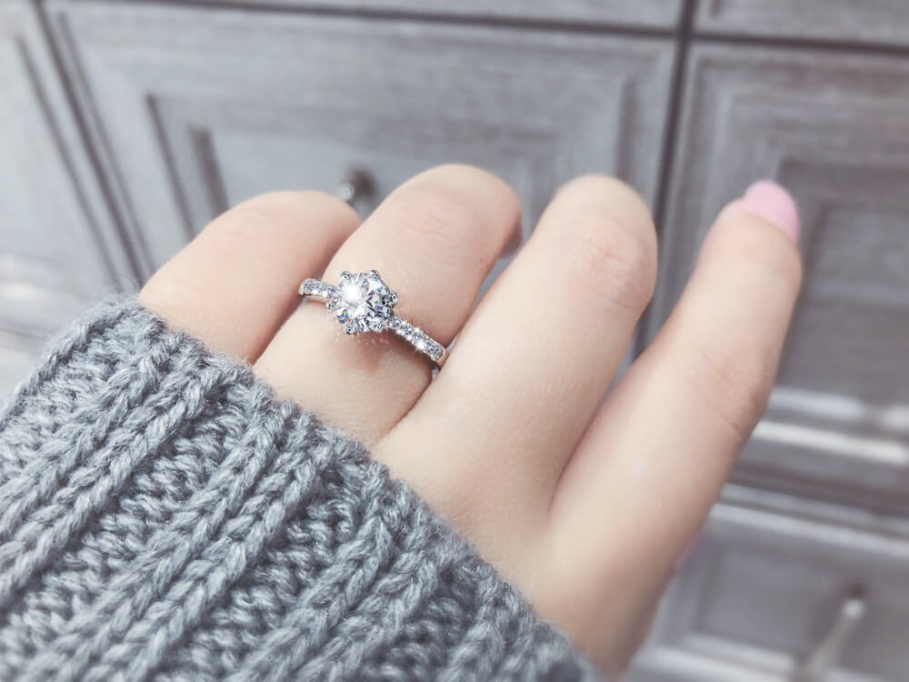 Diamond ring on girl's finger