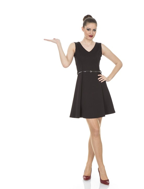 Woman wearing short black dress