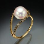Floating pearl ring design