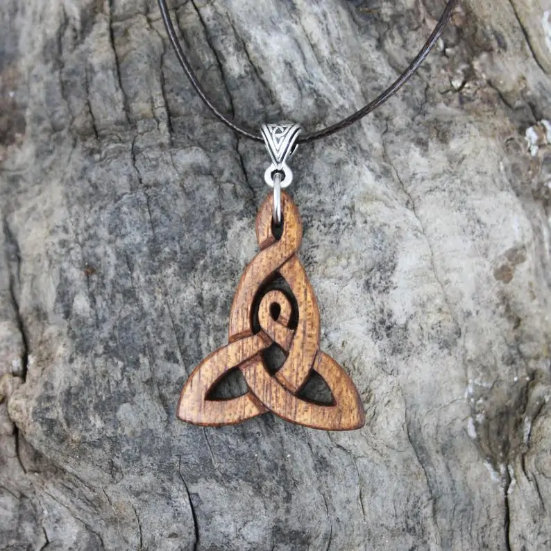 hand carved Celtic motherhood knot