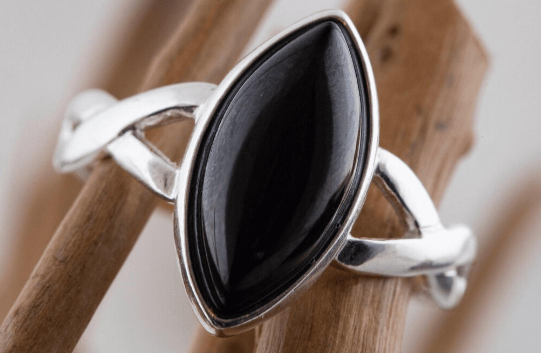 Jet black ring in silver setting
