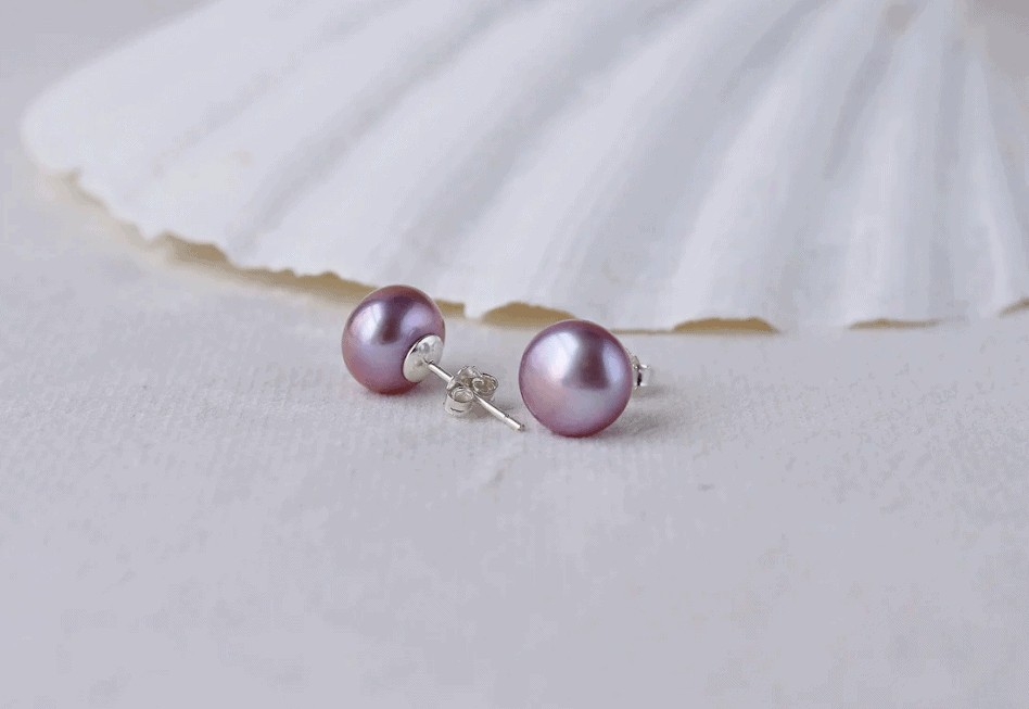 purple pearl studs on white background