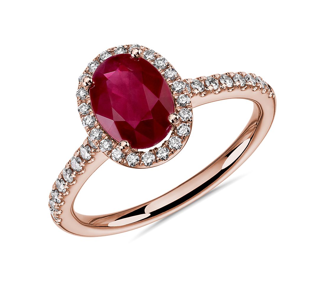 Oval Ruby and Round Diamond Halo Ring