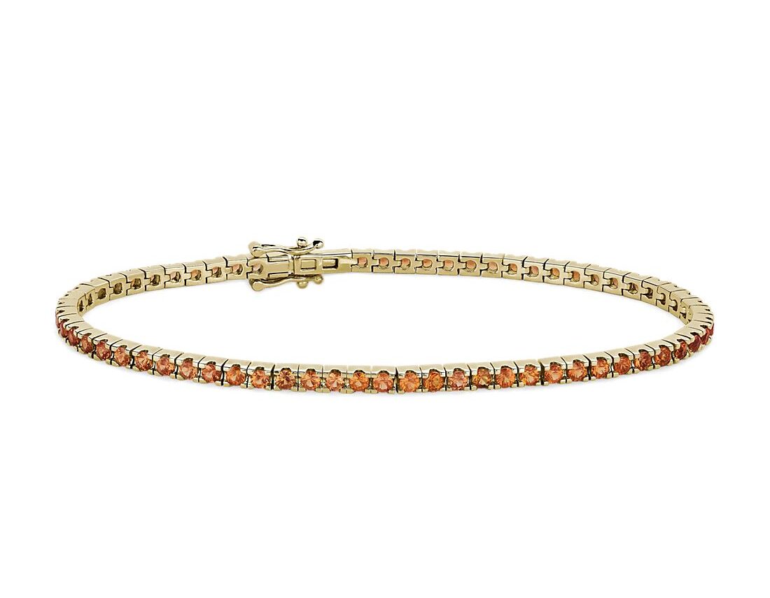 Orange sapphire tennis bracelet