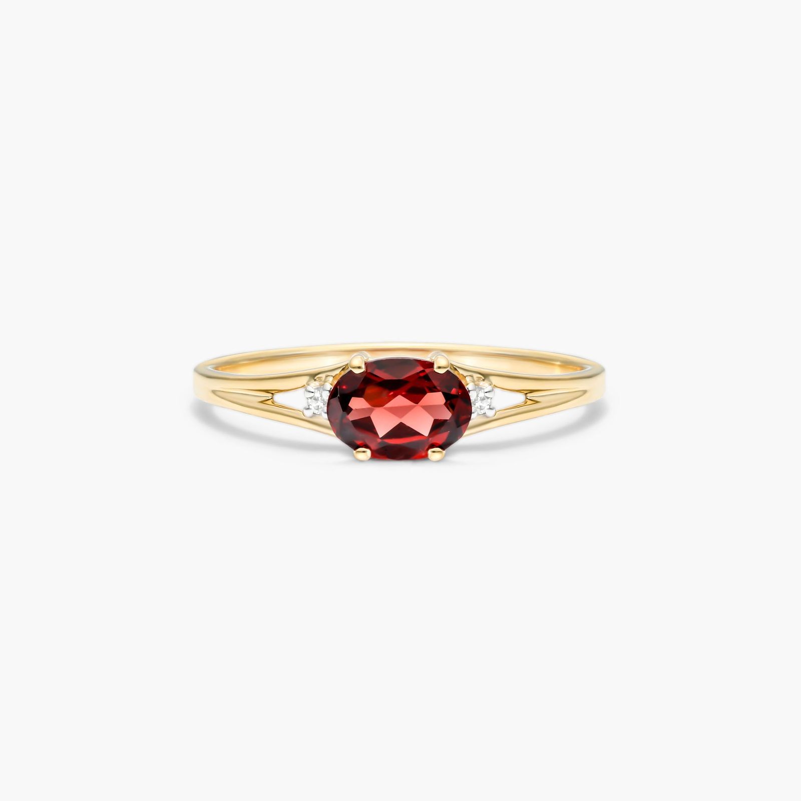 Oval Garnet And Diamond Ring
