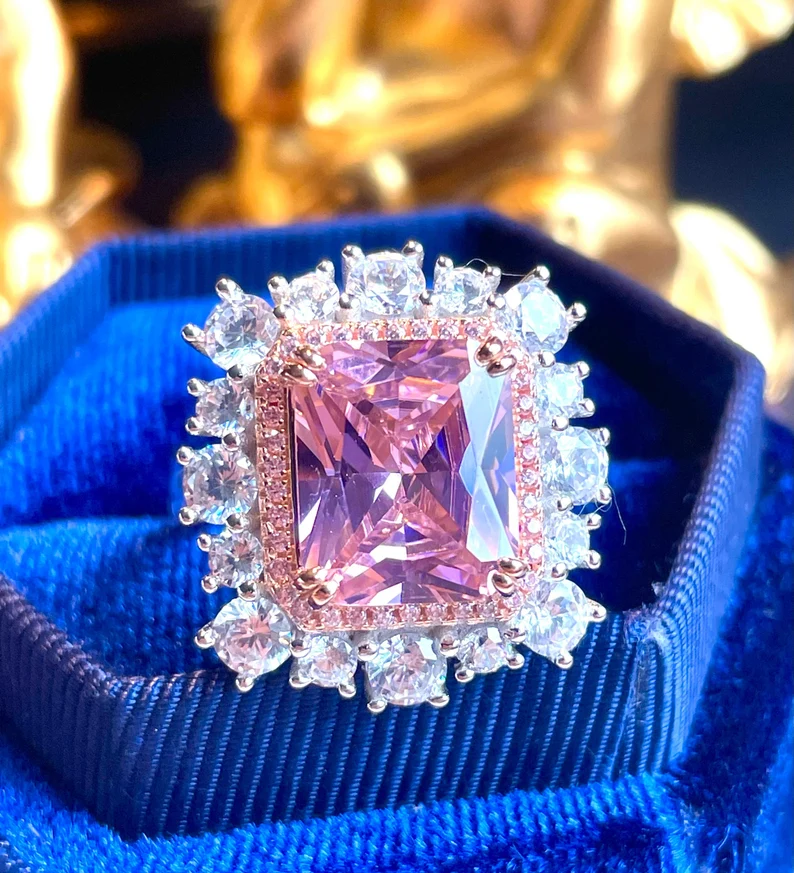 Pink diamond halo ring