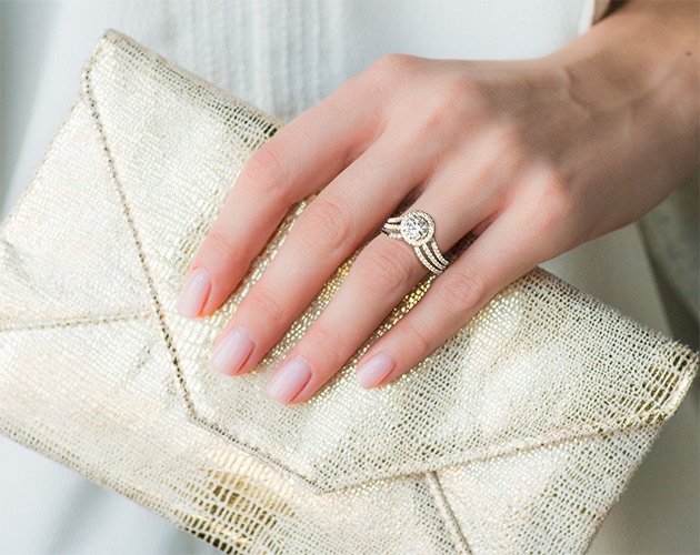 ring on finger with bag