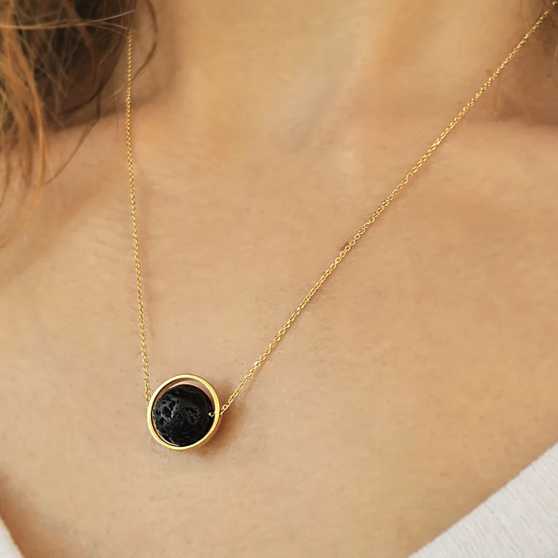 Lava stone spinner necklace