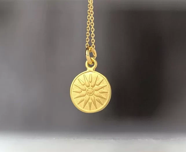 Solid gold sun disc necklace