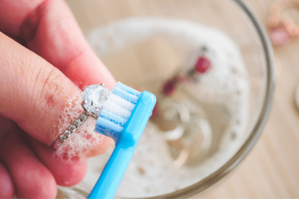 toothbrush cleaning moissanite ring