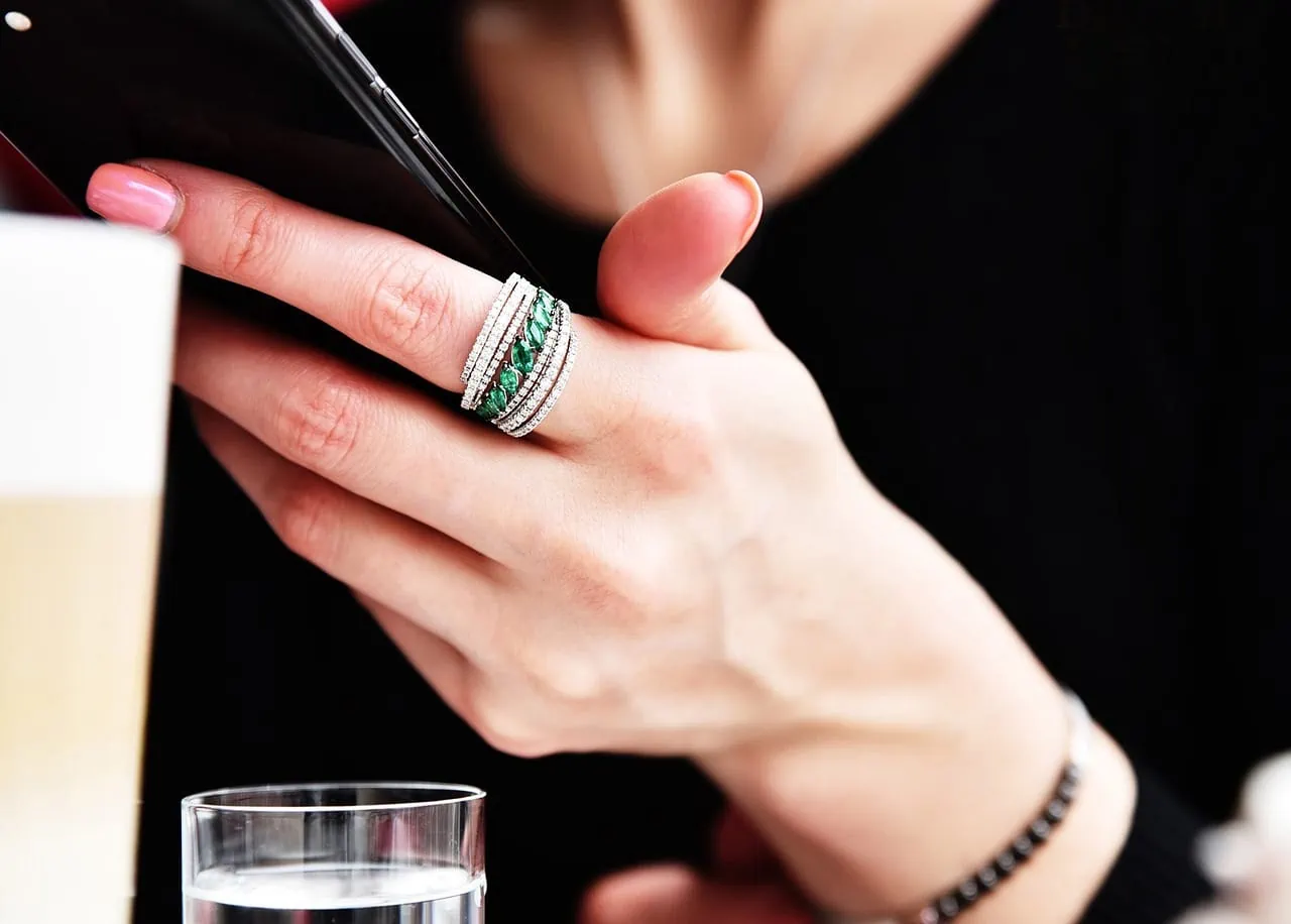 Girl wearing green gemstone ring