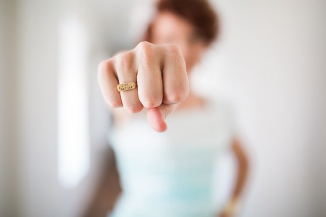 woman with ring saying badass