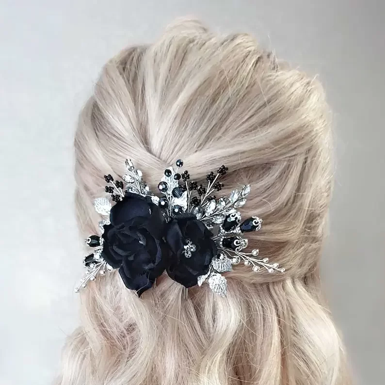 black flower gothic comb on a woman's head