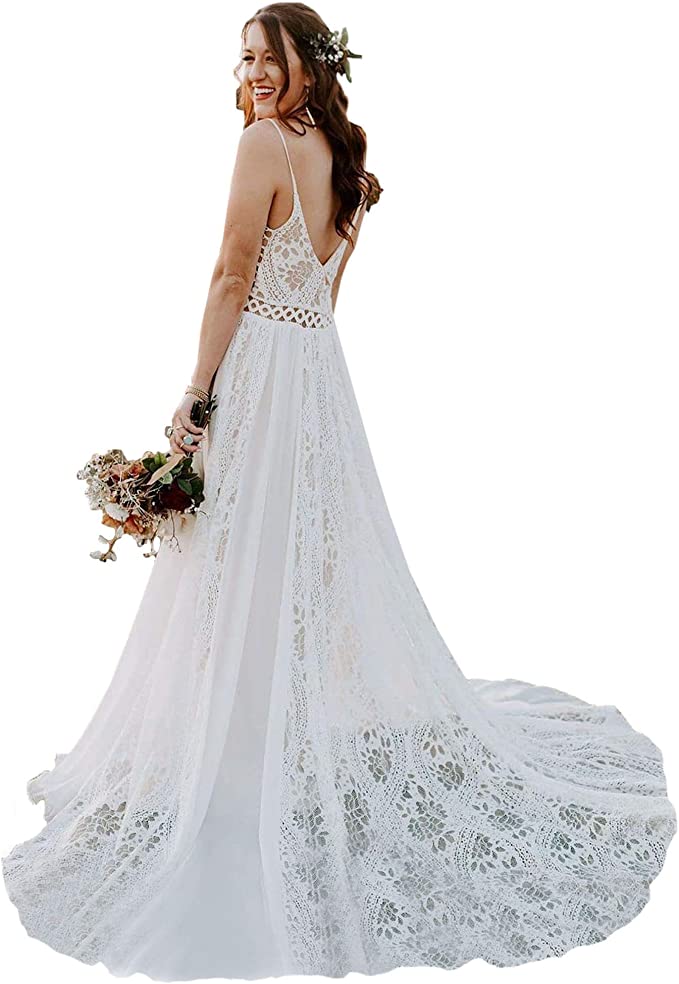 a woman wearing bohemian spaghetti strap wedding dress