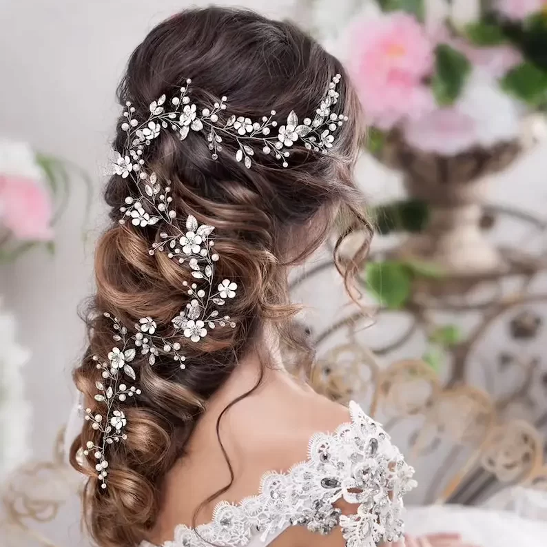 bridal pearl vine headpiece on the bride's head