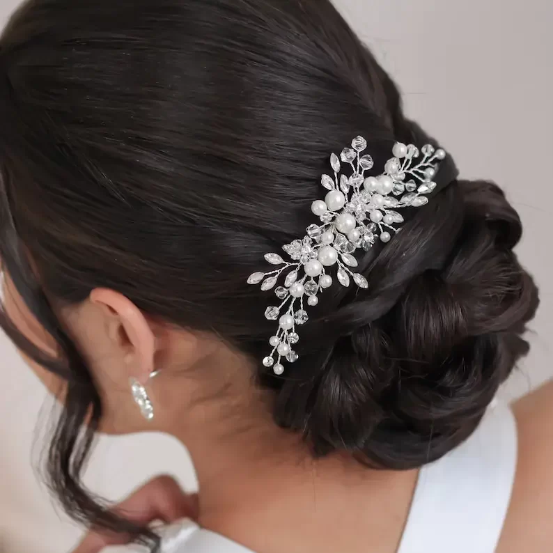 floral pearl bridal comb on a woman's head