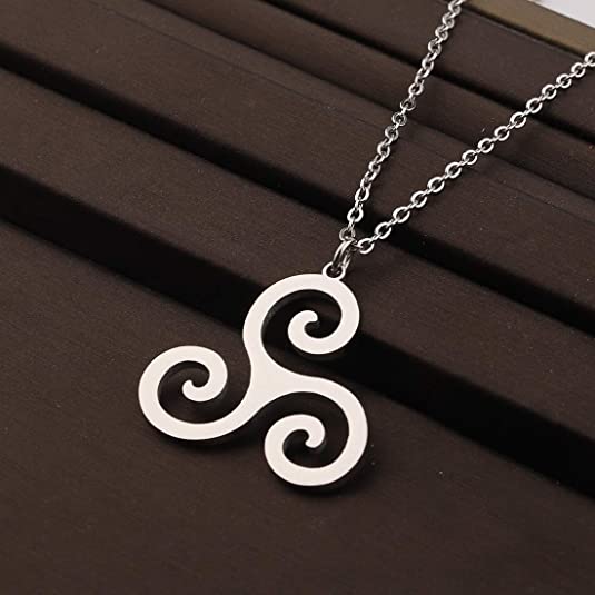 Triskelion Stainless Necklace on Brown Background