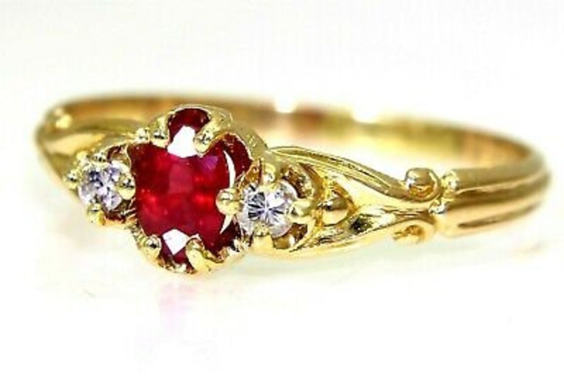 victorian inspired ruby ring in gold setting