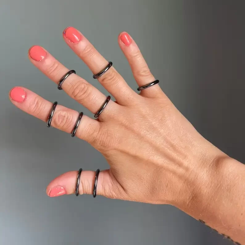 black hematite band rings on fingers