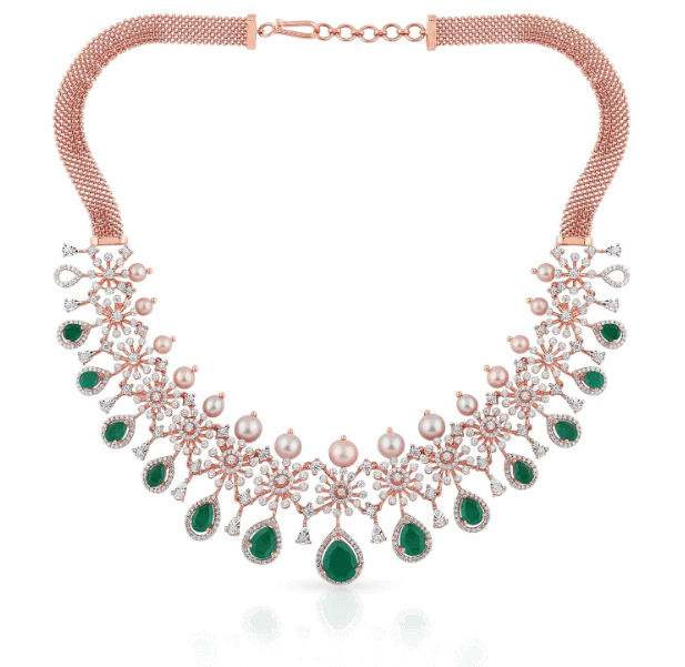 diamond and emerald necklace in rose gold