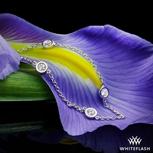 platinum diamond bracelet with purple flower background