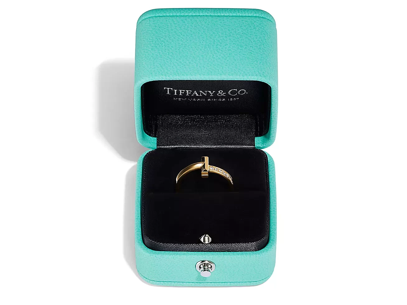 yellow gold with diamonds t1 ring in a jewelry box