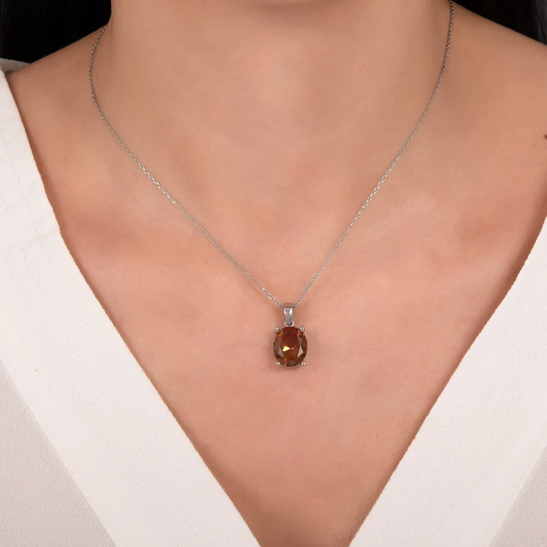 zultanite necklace on a woman's neck