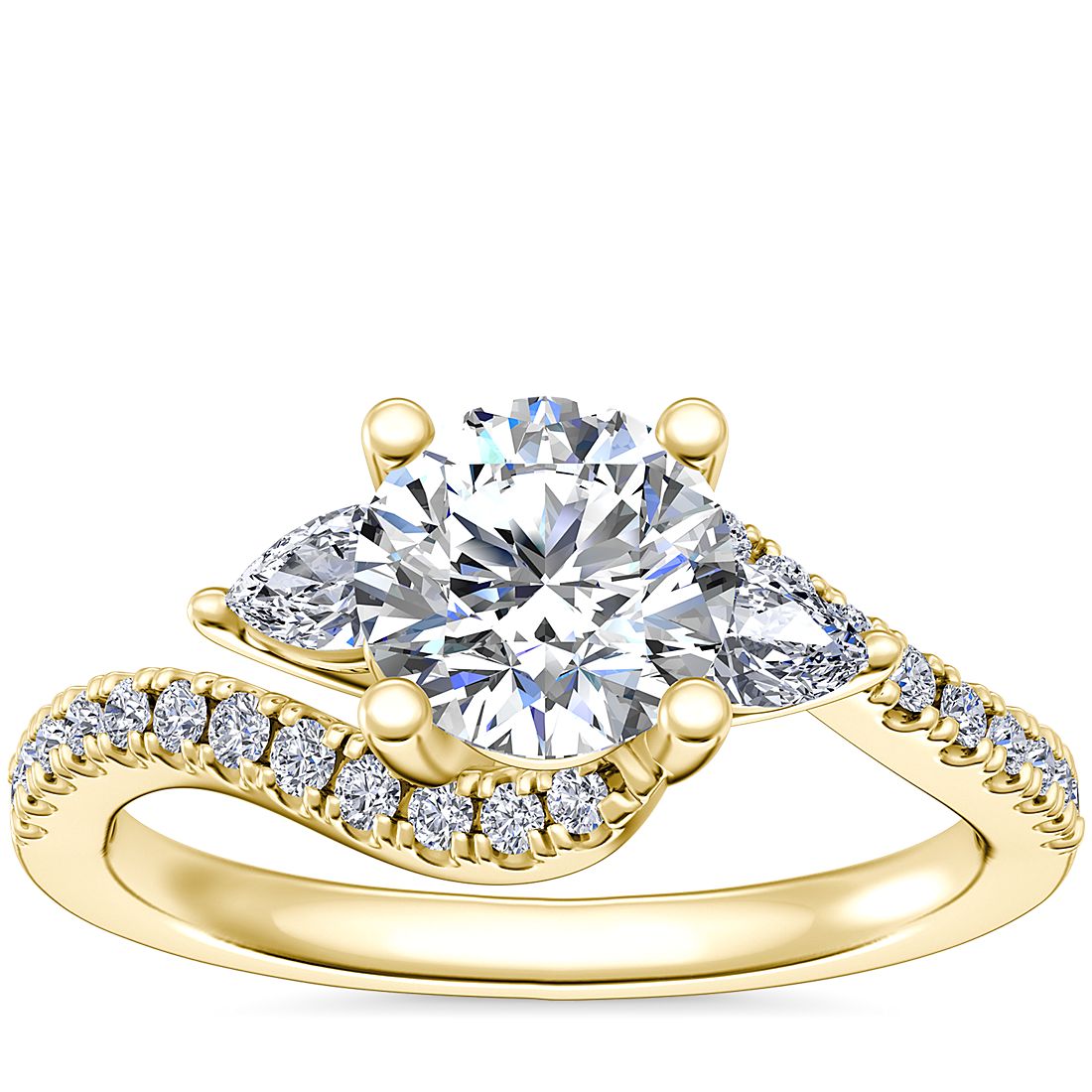 three-stone diamond engagement ring in gold setting