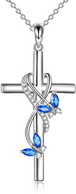 blue butterfly cross pendant
