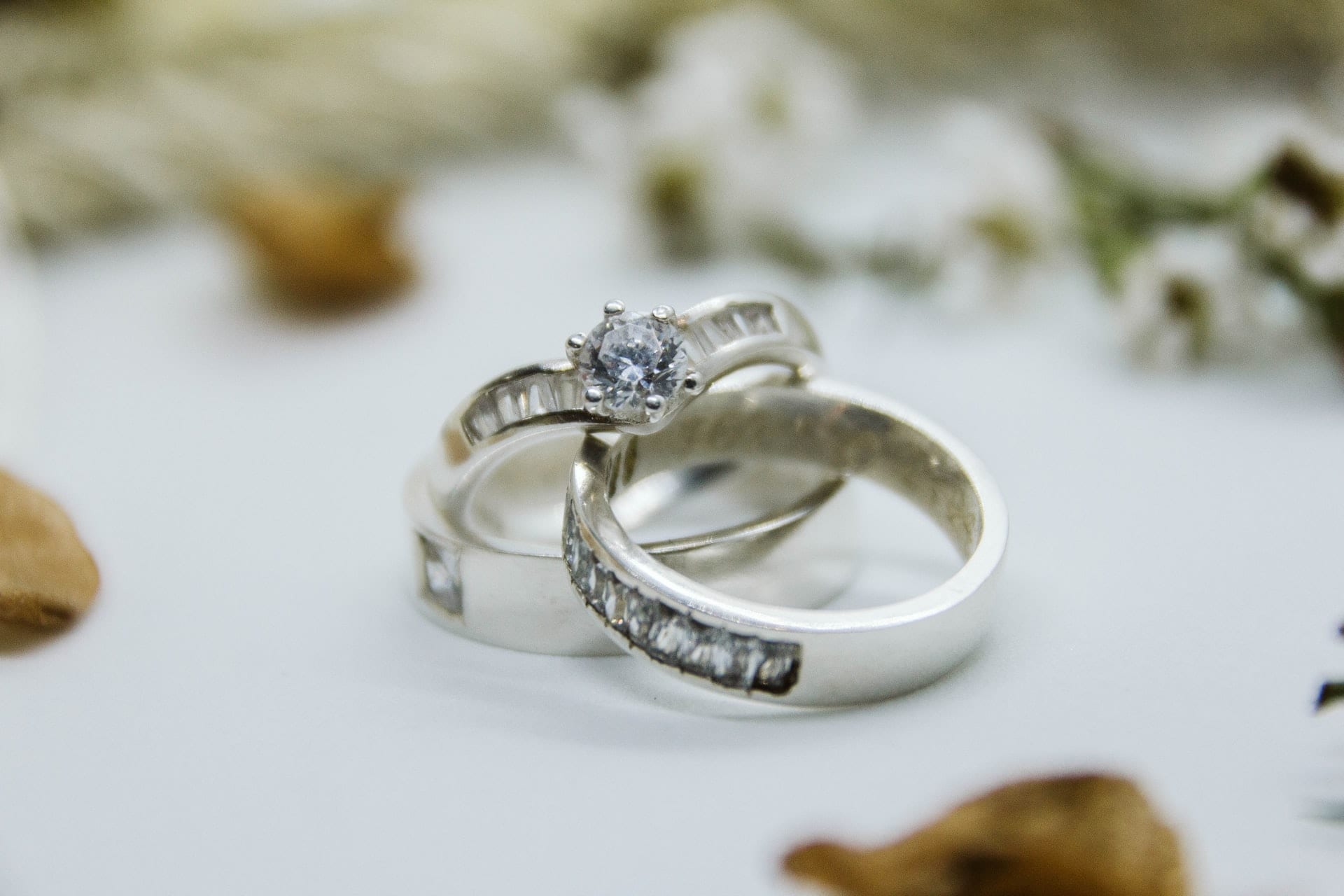 a pair of silver bridal rings