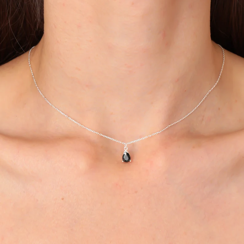 black obsidian dainty necklace on the neck