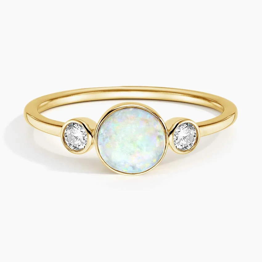 opal cabochon with diamond accents ring