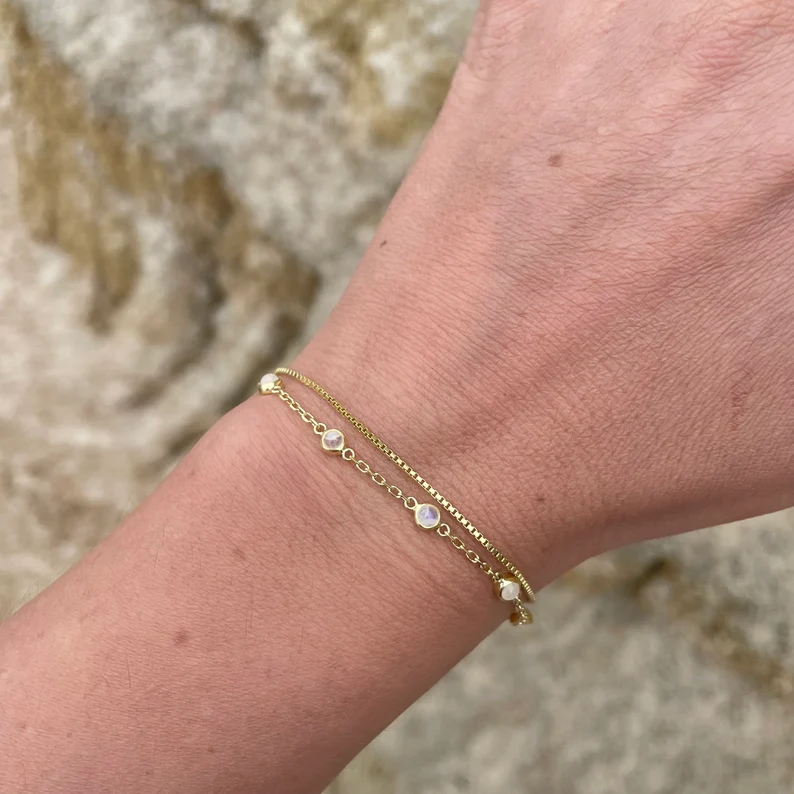 gold moonstone bracelet on the wrist