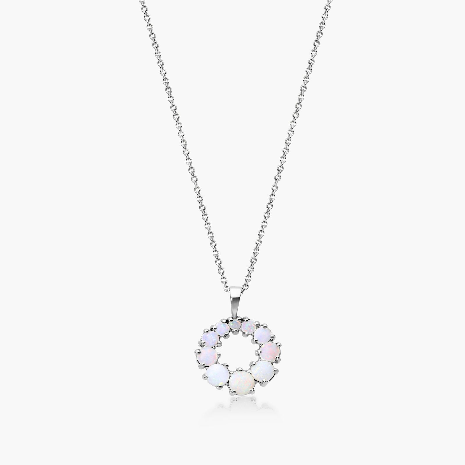 graduated opal pendant necklace in white gold setting