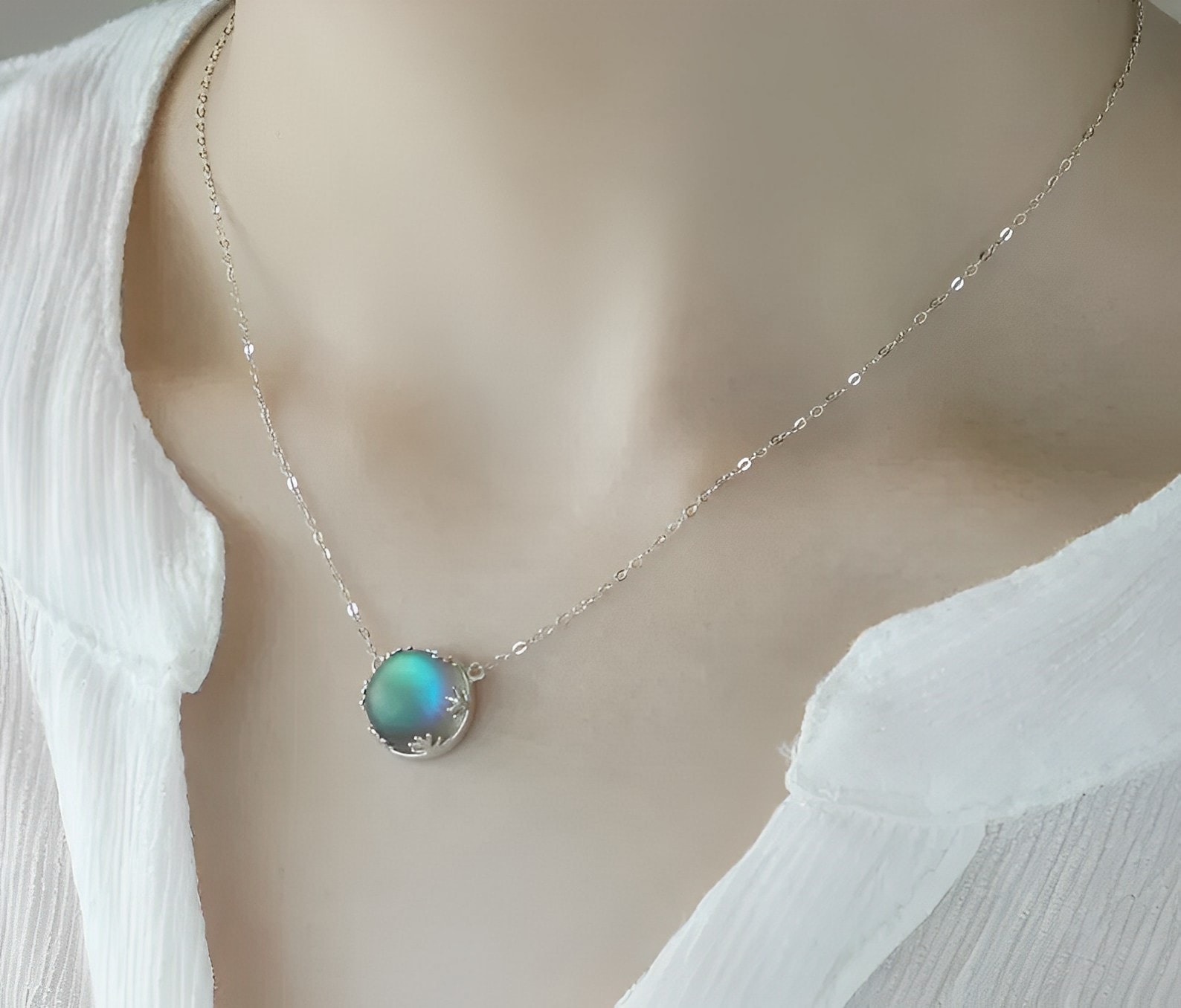 minimalist moonstone necklace on the neck