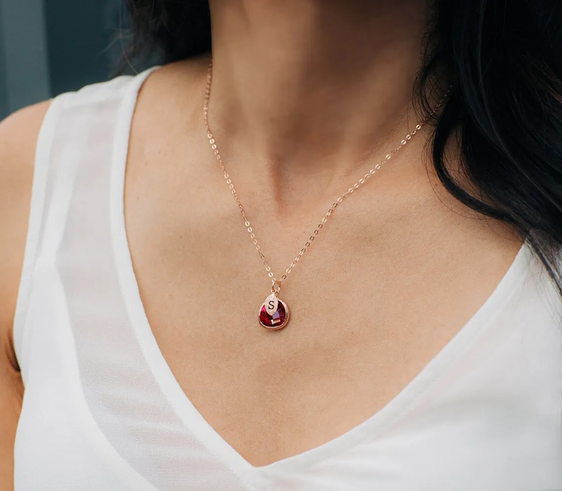 personalized ruby necklace on the woman's neck