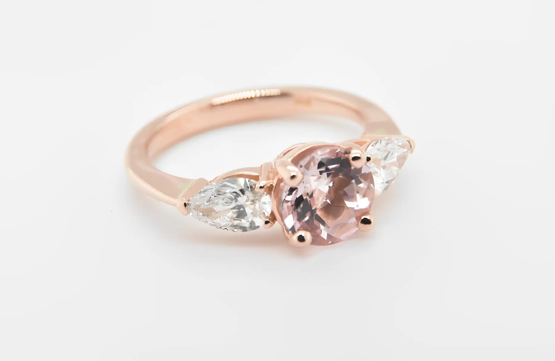 pink diamond engagement ring in rose gold settting