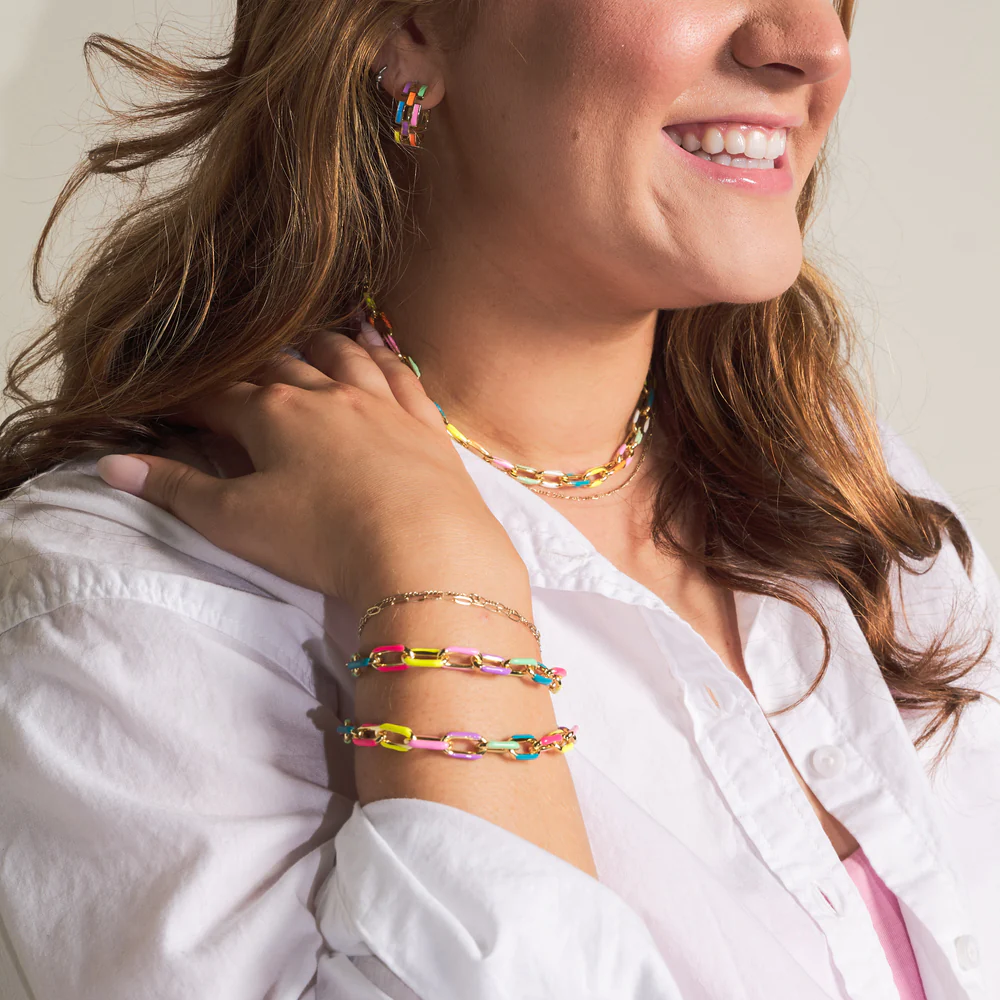 a woman wearing pippa colorful jewelries