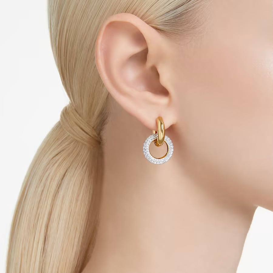 swarovski hoop earring on the woman's ear