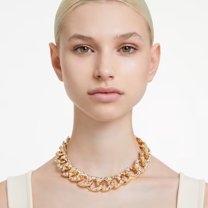swarovski statement necklace on the woman's neck