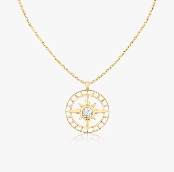 north star medallion necklace in yellow gold setting