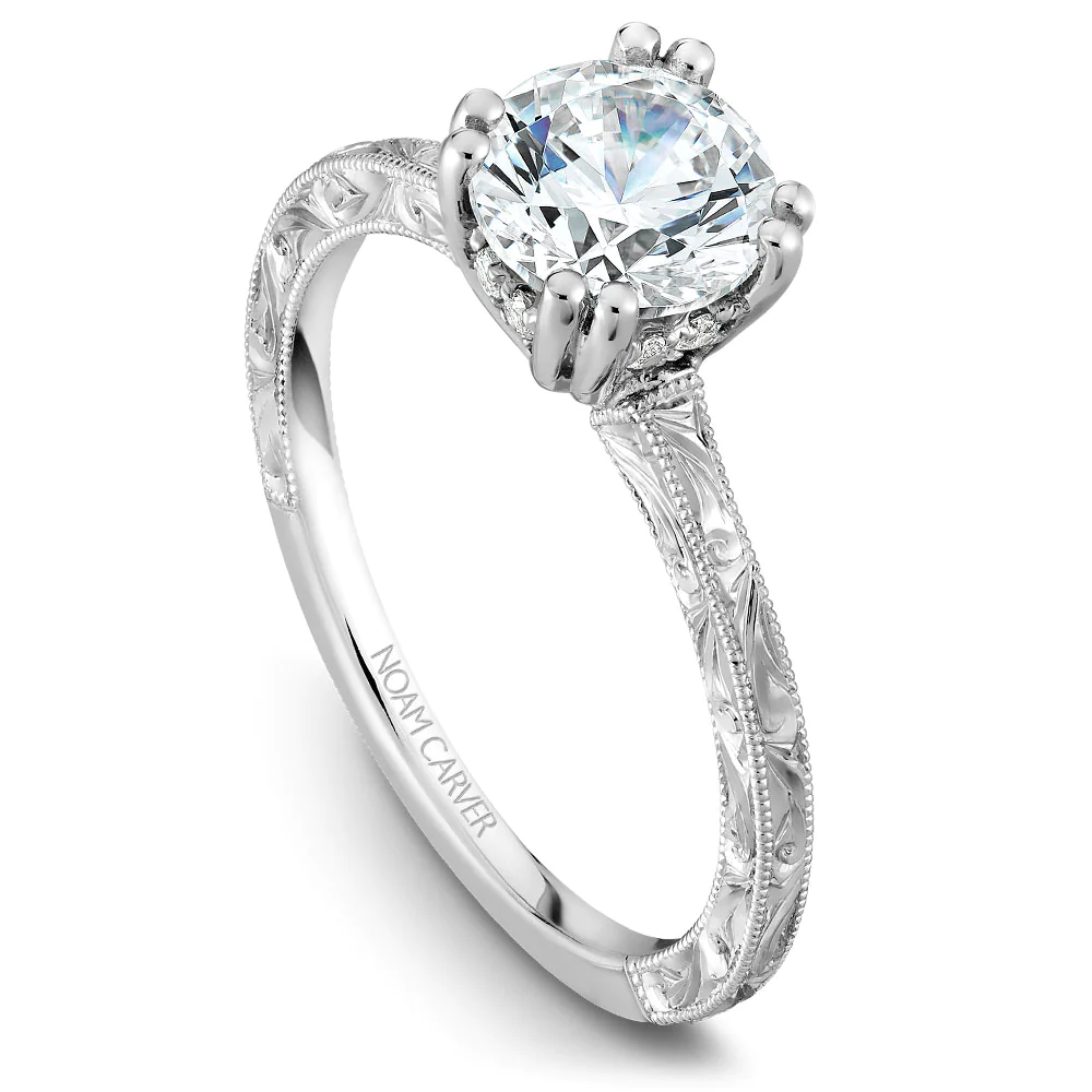 round diamond engagement ring in white gold setting